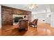 Living room featuring a brick fireplace and hardwood floors at 206 Chaussee Blvd, Summerville, SC 29483
