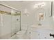Bright bathroom featuring a glass shower, modern vanity, and decorative mirror at 2063 Long Bend Dr, Seabrook Island, SC 29455