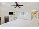 Comfortable bedroom featuring a ceiling fan, neutral decor, and bright lighting at 2063 Long Bend Dr, Seabrook Island, SC 29455