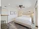 Cozy bedroom with a king size bed, modern lighting fixtures, and neutral colored decor at 2063 Long Bend Dr, Seabrook Island, SC 29455