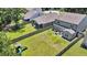Aerial view of the home's backyard with a play set and surrounding fenced yard at 2109 Rowan Rd, Johns Island, SC 29455