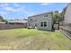 View of the fenced backyard with an outdoor patio set at 2109 Rowan Rd, Johns Island, SC 29455