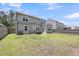 View of the backyard and patio, enclosed by a wooden fence at 2109 Rowan Rd, Johns Island, SC 29455