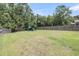 View of the backyard with a wooden fence and a playground at 2109 Rowan Rd, Johns Island, SC 29455