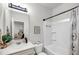 Bathroom featuring a tub and shower combination, large mirror, and a white vanity at 2109 Rowan Rd, Johns Island, SC 29455