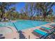 Large community pool with lounge chairs and tables for residents to enjoy at 2109 Rowan Rd, Johns Island, SC 29455
