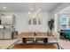 Dining area features a large wooden table, chandelier lighting, and neutral decor at 2109 Rowan Rd, Johns Island, SC 29455