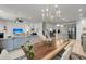 Open floor plan with a dining area that flows into a living room and kitchen area at 2109 Rowan Rd, Johns Island, SC 29455