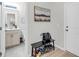 Convenient entryway featuring a bench with shoe storage and a half bathroom at 2109 Rowan Rd, Johns Island, SC 29455