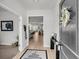 Inviting entryway showcasing a modern design with an open view to the kitchen and living area at 2109 Rowan Rd, Johns Island, SC 29455