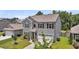 Charming two-story home featuring a two-car garage, well-maintained lawn, and attractive landscaping at 2109 Rowan Rd, Johns Island, SC 29455