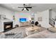 Inviting living room with a fireplace and a comfortable sofa with decorative elements at 2109 Rowan Rd, Johns Island, SC 29455