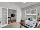 Bright office featuring double French doors, a large window, and a desk at 2109 Rowan Rd, Johns Island, SC 29455