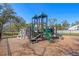 Community playground featuring climbing structures, slides, and a soft surface at 2109 Rowan Rd, Johns Island, SC 29455