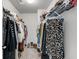 Walk-in closet with clothing racks and shelves for organized storage of apparel at 2109 Rowan Rd, Johns Island, SC 29455
