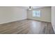 Bright and airy bedroom with a ceiling fan and large window, offering plenty of natural light at 2150 Spoleto Ln # H2, North Charleston, SC 29406