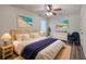 Inviting bedroom boasts beachy decor, ceiling fan, bedside lamps, and woven accents for a cozy retreat at 2150 Spoleto Ln # H2, North Charleston, SC 29406