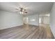 Open living space with sleek floors and an open layout connecting the living area to the kitchen at 2150 Spoleto Ln # H2, North Charleston, SC 29406