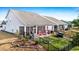 Beautiful backyard with patio, fire pit, fence, and well-maintained lawn at 218 River Martin Ct, Summerville, SC 29483