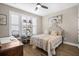 Cozy bedroom with neutral colors, natural light, and a study area at 218 River Martin Ct, Summerville, SC 29483