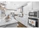 Bright kitchen featuring stainless steel appliances, center island, and white cabinets with great countertop space at 218 River Martin Ct, Summerville, SC 29483