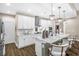 Beautiful kitchen featuring stainless appliances, granite countertops, and large island, creating an open airy space at 218 River Martin Ct, Summerville, SC 29483