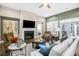 Cozy living room with a fireplace, plush seating, and elegant decor creating an inviting atmosphere at 218 River Martin Ct, Summerville, SC 29483