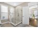Elegant bathroom with a glass shower stall and natural light at 218 River Martin Ct, Summerville, SC 29483
