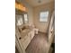 Bathroom with granite sink, vanity, new floors, and modern light fixture at 2204 Andover Way, Mount Pleasant, SC 29466