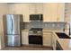 Kitchen with stainless steel appliances, white cabinets, subway tile backsplash and granite countertops at 2204 Andover Way, Mount Pleasant, SC 29466