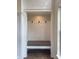 Mudroom features a built-in bench, coat hooks, and natural light at 2204 Andover Way, Mount Pleasant, SC 29466