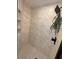 Close-up of tiled walk-in shower with rainfall shower head at 2204 Andover Way, Mount Pleasant, SC 29466