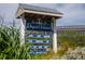 Community sign for Daniel Island displaying local event information at 2431 Settlers St, Charleston, SC 29492