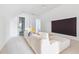 Bright home theater features plush seating and a large projection screen for immersive entertainment at 2431 Settlers St, Charleston, SC 29492