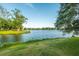 Picturesque lake view surrounded by lush greenery, creating a serene and natural environment at 2431 Settlers St, Charleston, SC 29492