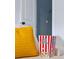 Close-up of a cozy movie night setup featuring a couch, popcorn, and a decorative yellow pillow at 2431 Settlers St, Charleston, SC 29492
