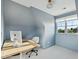 This home office features natural light and ample desk space at 2431 Settlers St, Charleston, SC 29492