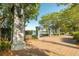 Scenic park walkway featuring stone entrance pillars, benches, and beautiful waterfront views at 2431 Settlers St, Charleston, SC 29492