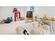 Bright playroom featuring comfortable seating, a chalkboard, and various toys for to enjoy at 2431 Settlers St, Charleston, SC 29492