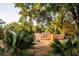 Fun playground featuring a pirate ship, surrounded by lush greenery and mature trees at 2431 Settlers St, Charleston, SC 29492