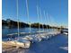 Row of numbered sailboats lined up along a floating dock on the water at 2431 Settlers St, Charleston, SC 29492