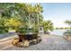 Decorative water feature with stone accents in a scenic park setting with lush greenery and lake views at 2431 Settlers St, Charleston, SC 29492