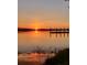 Picturesque water view at sunset, reflecting orange and yellow hues on the calm water at 2431 Settlers St, Charleston, SC 29492