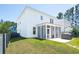 Exterior of a white two-story home with a screened porch and a well-maintained lawn at 262 Great Lawn Dr, Summerville, SC 29486