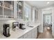 Bright kitchen featuring white cabinets, countertops, tile backsplash and stainless steel appliances at 262 Great Lawn Dr, Summerville, SC 29486