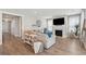 Cozy living room with fireplace, large TV, and neutral décor at 262 Great Lawn Dr, Summerville, SC 29486