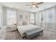 Comfortable main bedroom with a ceiling fan and plenty of natural light at 262 Great Lawn Dr, Summerville, SC 29486