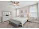 Serene main bedroom featuring neutral colors, a ceiling fan, and ample natural light at 262 Great Lawn Dr, Summerville, SC 29486