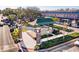 Aerial view of a charming town square with a pavilion, landscaping, and walkable shops at 262 Great Lawn Dr, Summerville, SC 29486
