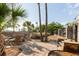 Inviting backyard patio with a cozy fire pit and comfortable Adirondack chairs, perfect for outdoor gatherings at 2705 Parkers Landing Rd, Mount Pleasant, SC 29466